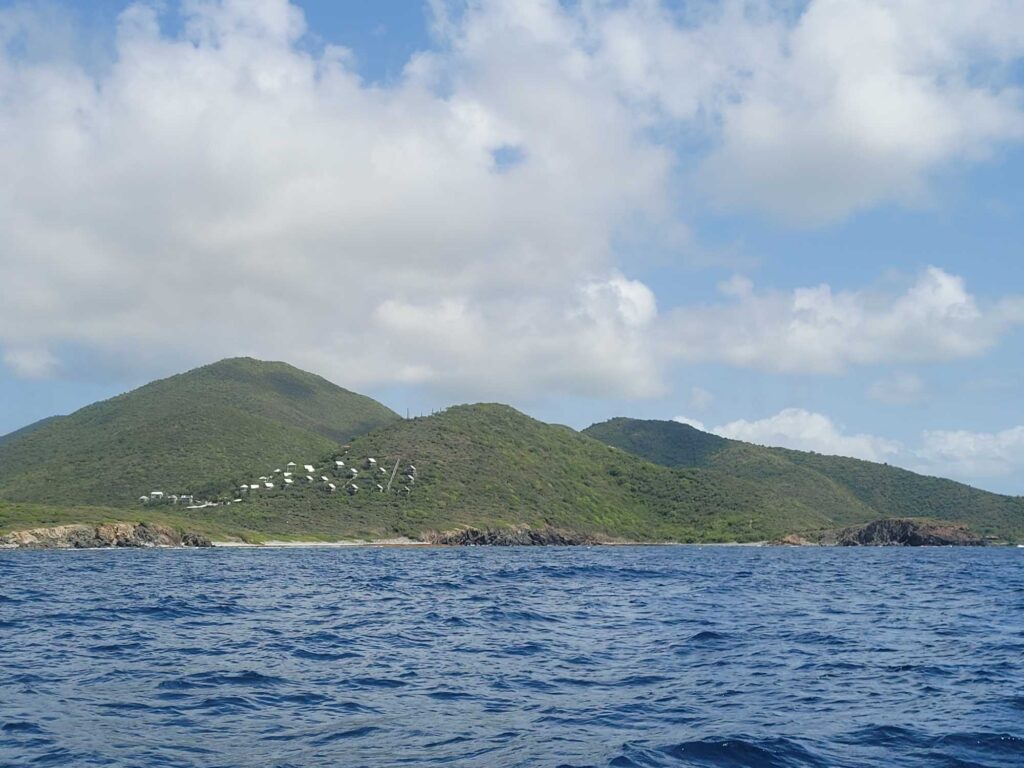 a body of water with hills in the background (MyCoast AI)