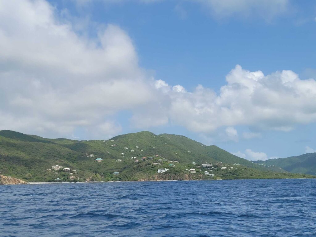 a body of water with a hill in the background (MyCoast AI)