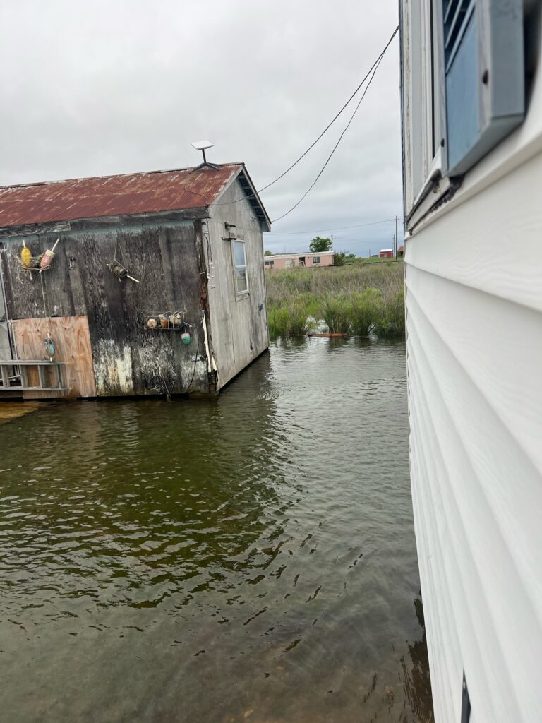 a body of water with buildings along it (MyCoast AI)