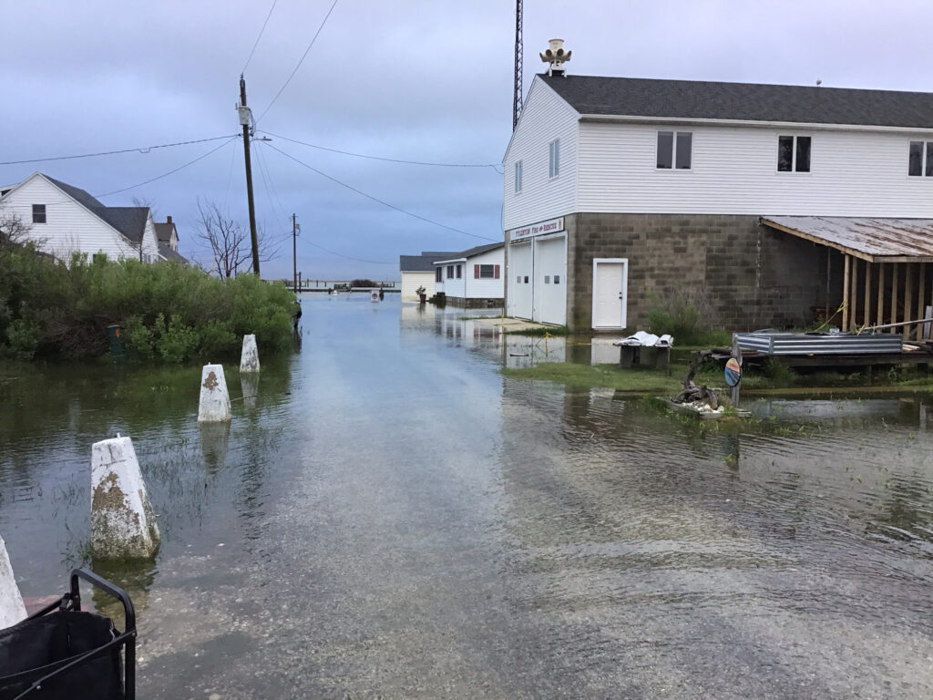 a flooded area with a few buildings (MyCoast AI)