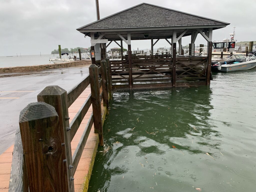 a dock with a boat in the water (MyCoast AI)