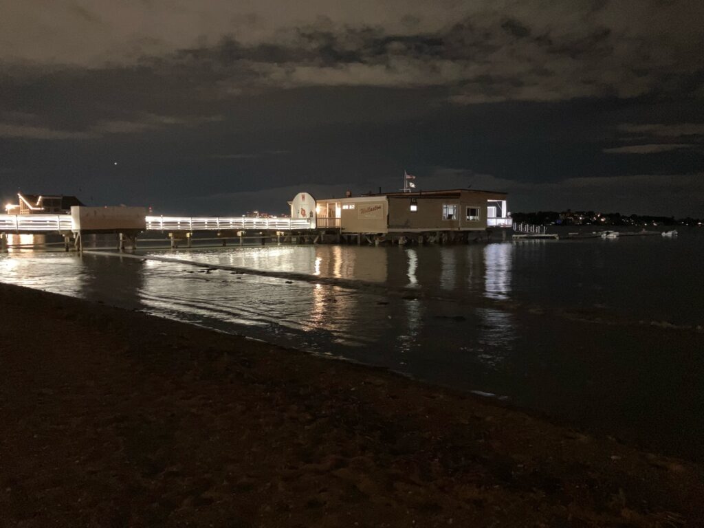 a beach with buildings along it (MyCoast AI)