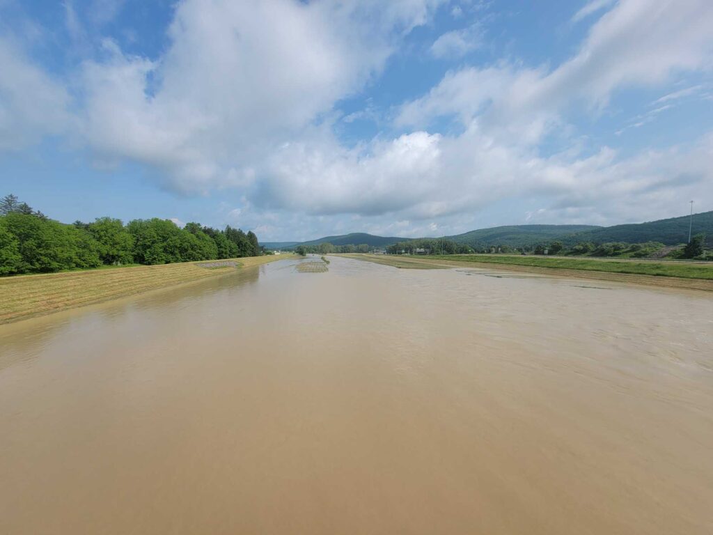 a river with a small dam (MyCoast AI)