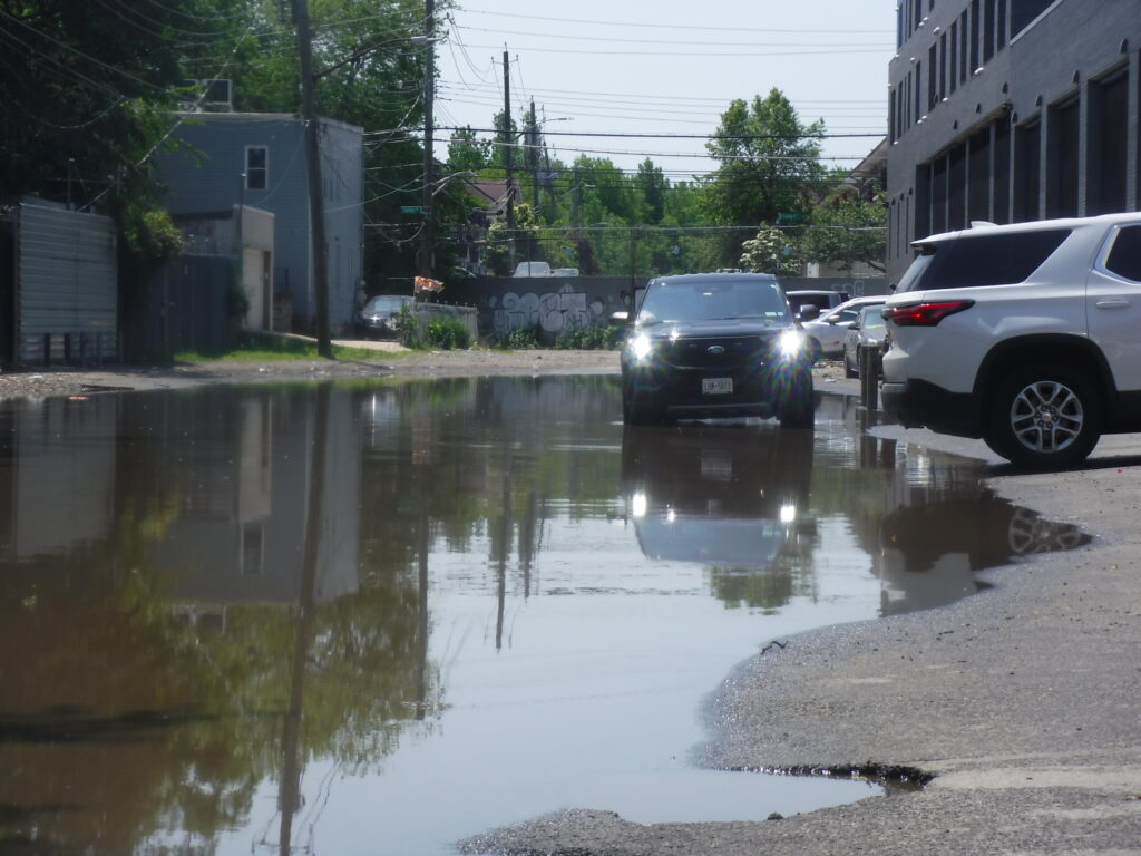 cars on a flooded street (MyCoast AI)