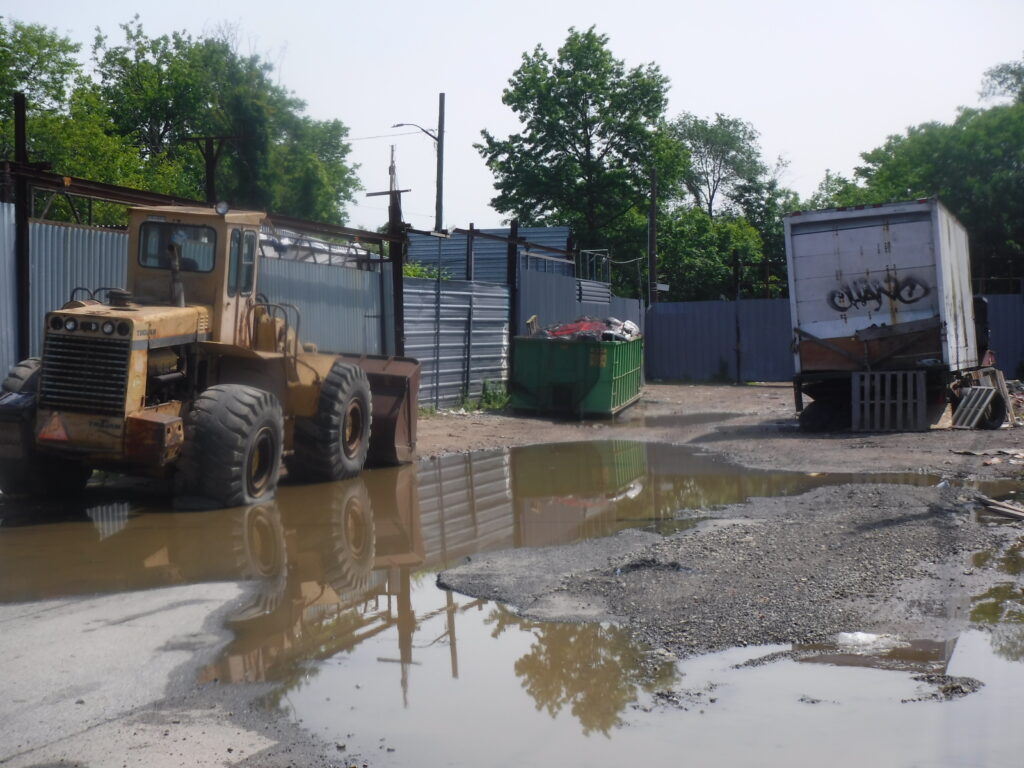 a truck driving through a flooded area (MyCoast AI)