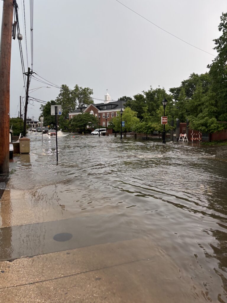 a flooded street with cars (MyCoast AI)
