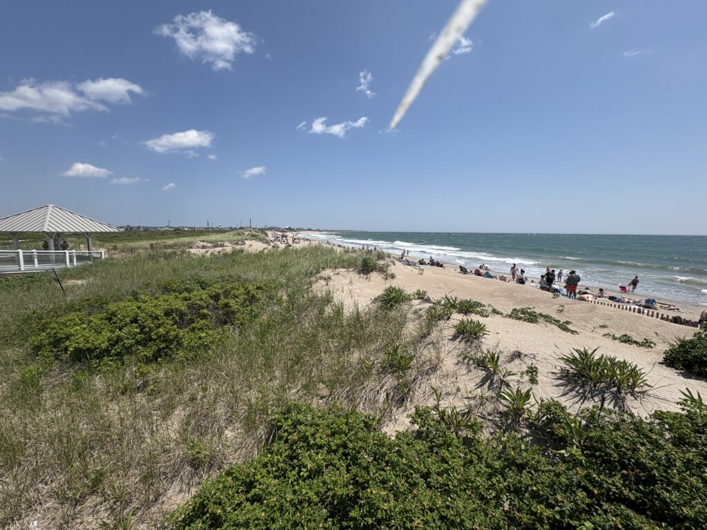 a beach with people on it (MyCoast AI)