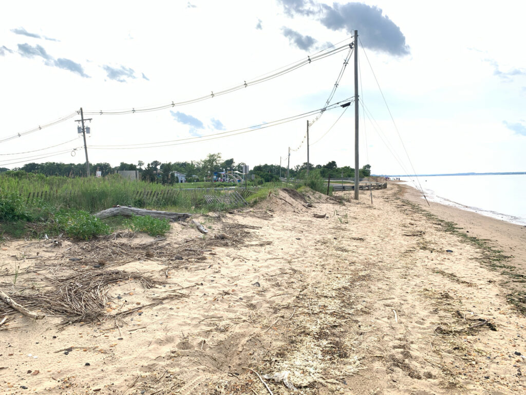 a sandy beach with power lines (MyCoast AI)