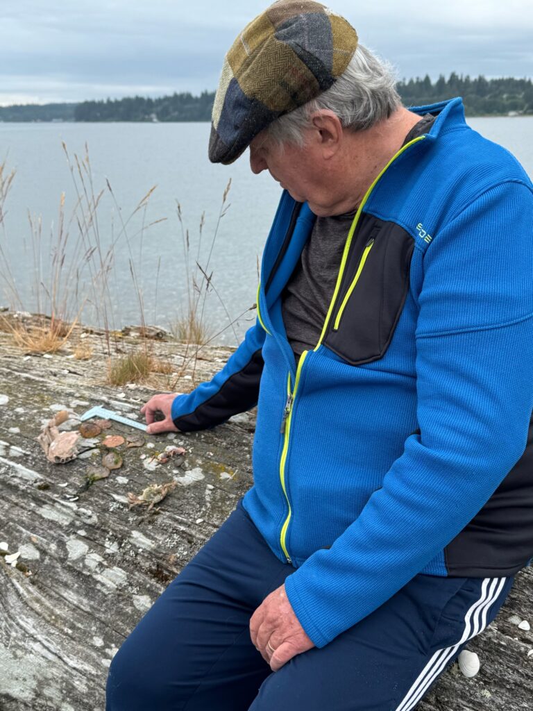 a person holding a fish (MyCoast AI)