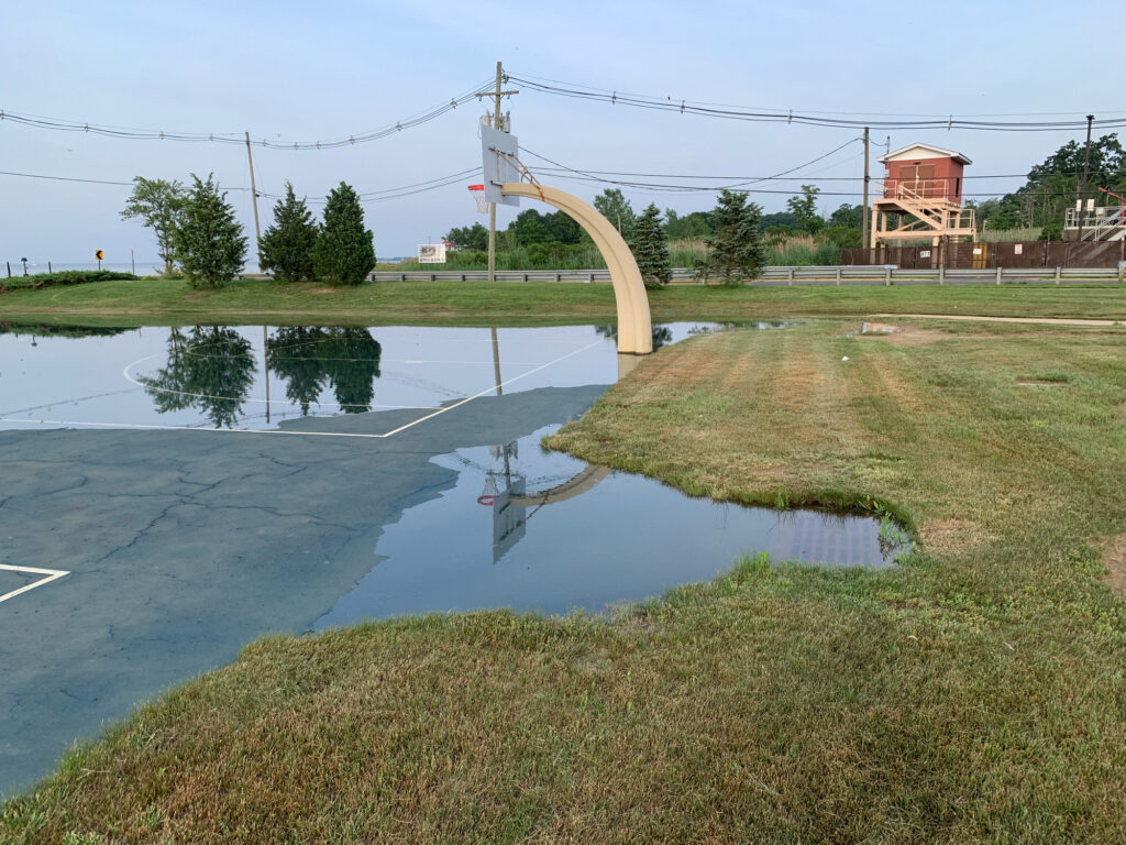 a pond with a pipe in it (MyCoast AI)