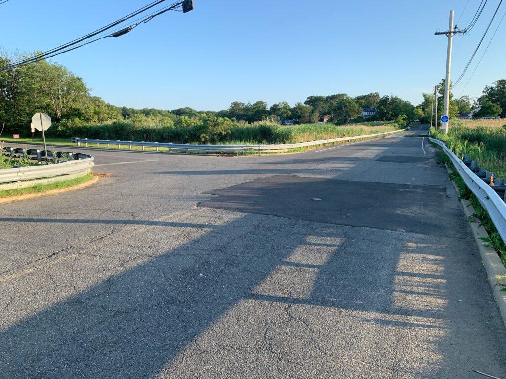 a road with trees on the side (MyCoast AI)