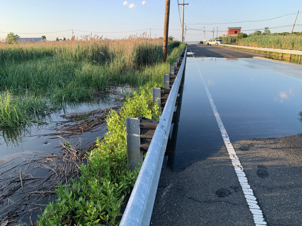 a road with water on the side (MyCoast AI)