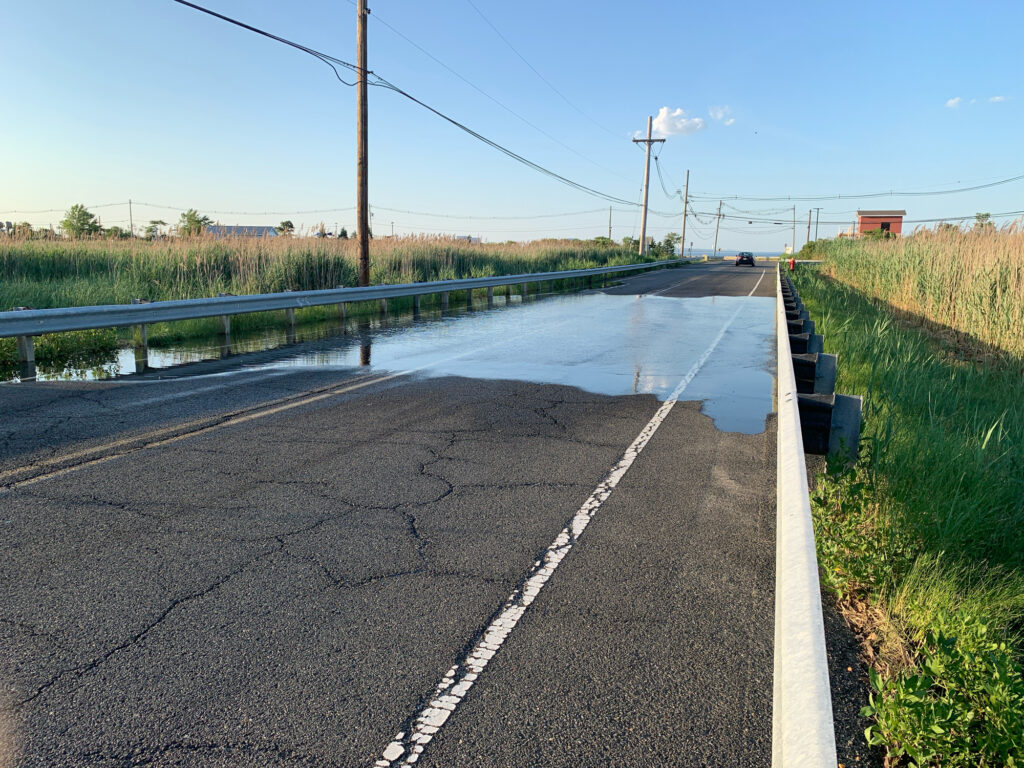 a road with water on the side (MyCoast AI)