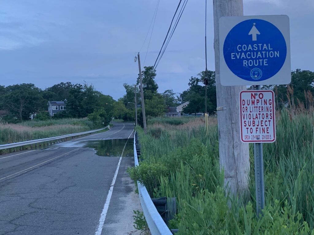 a sign on the side of a road (MyCoast AI)