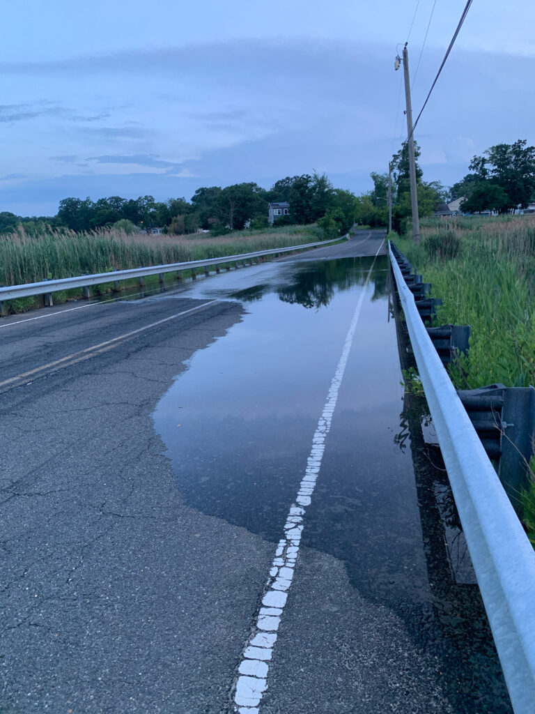 a road with water on the side (MyCoast AI)