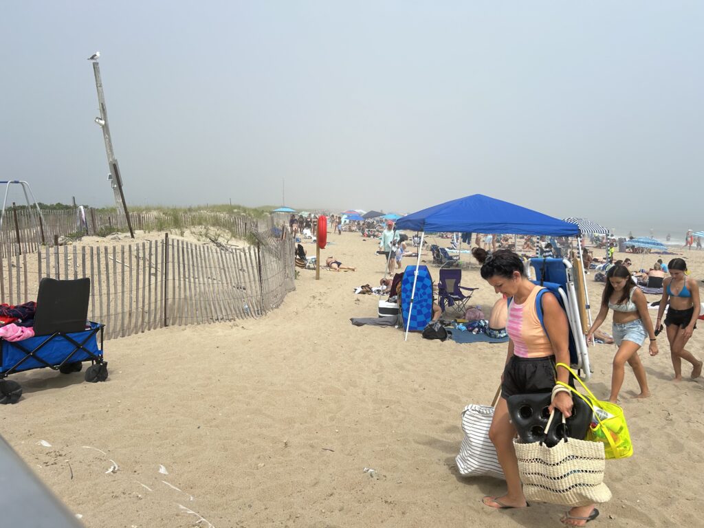 a person sitting on a beach (MyCoast AI)