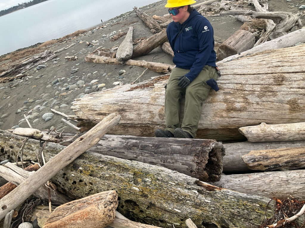 a man standing on a log (MyCoast AI)