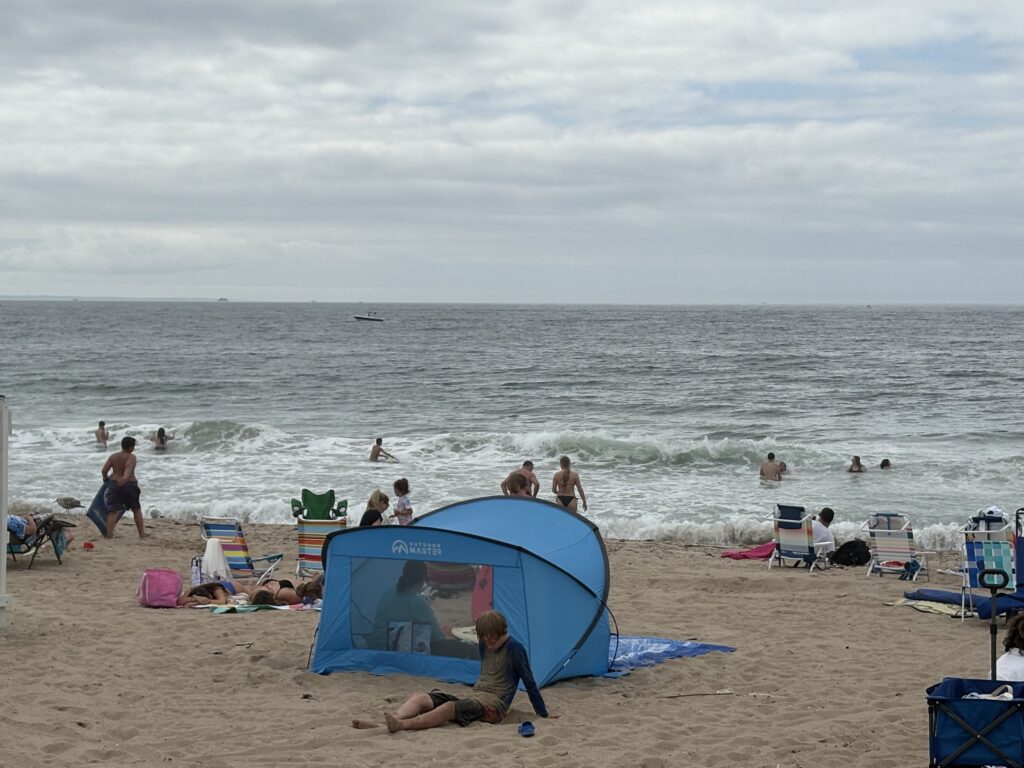 people on a beach (MyCoast AI)