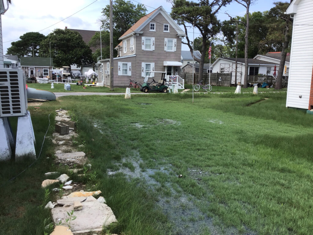 a yard with a tractor parked in it (MyCoast AI)