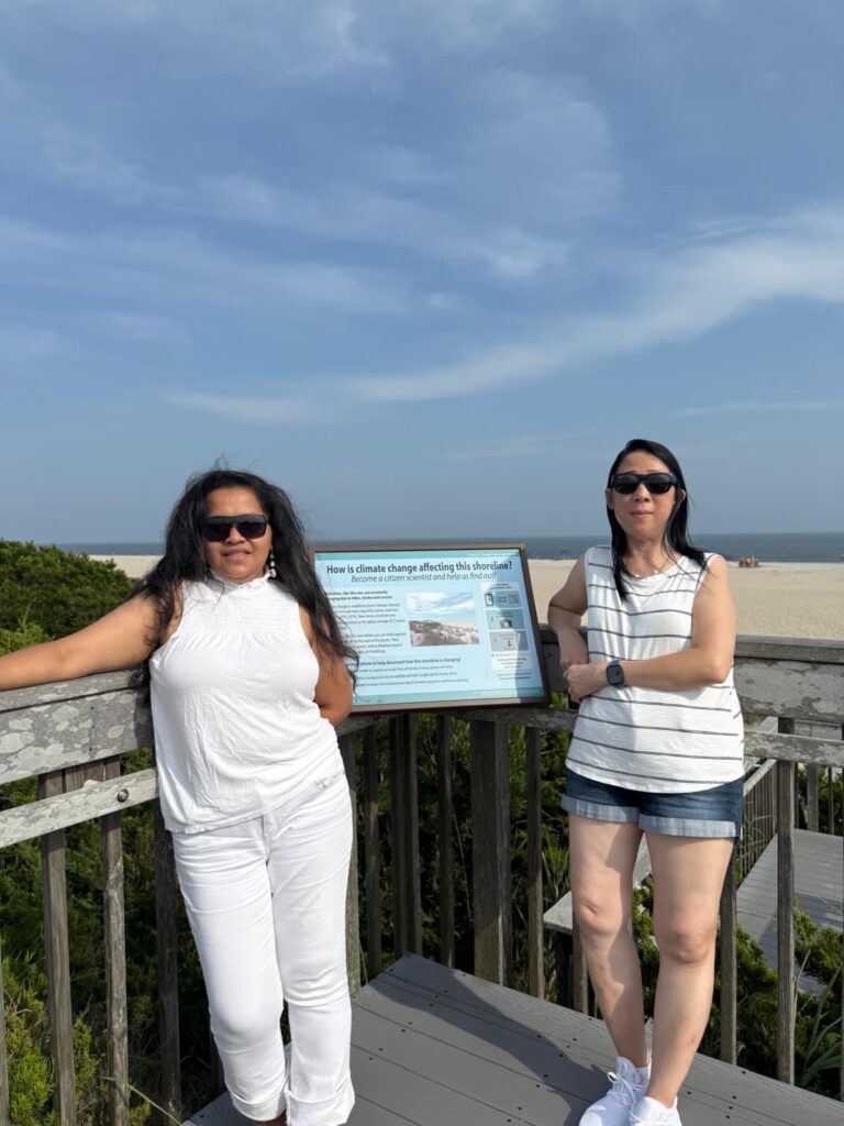 two women posing for a picture (MyCoast AI)