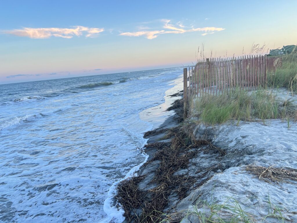 a beach with waves crashing on it (MyCoast AI)