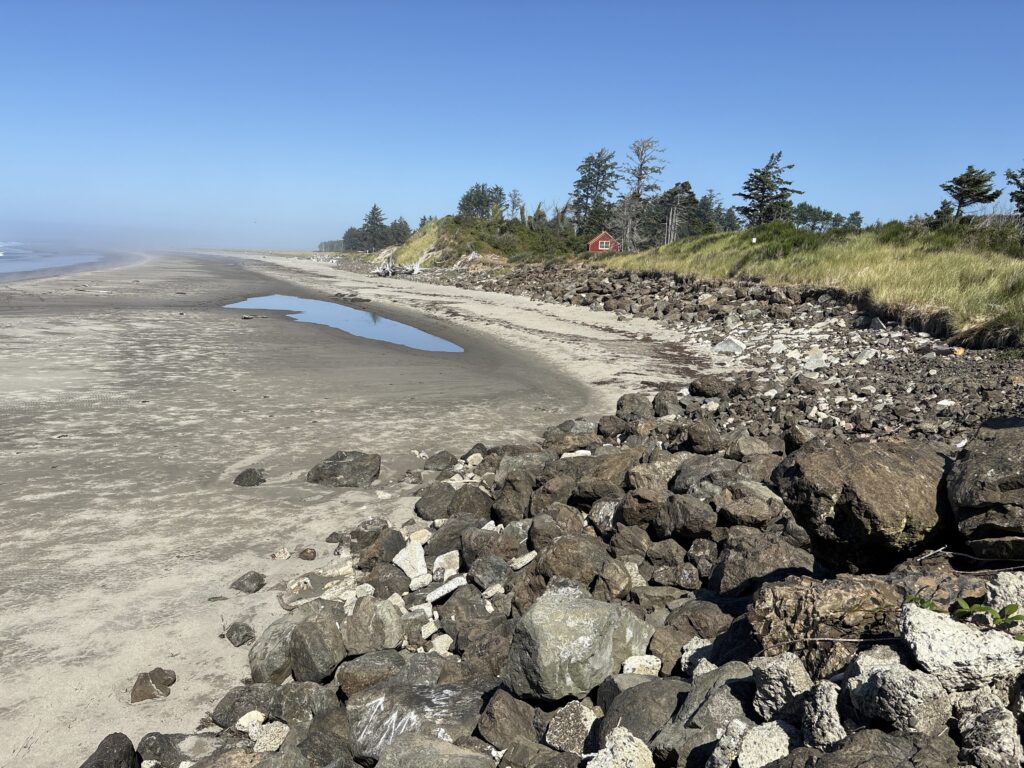 a rocky beach with a small pond (MyCoast AI)