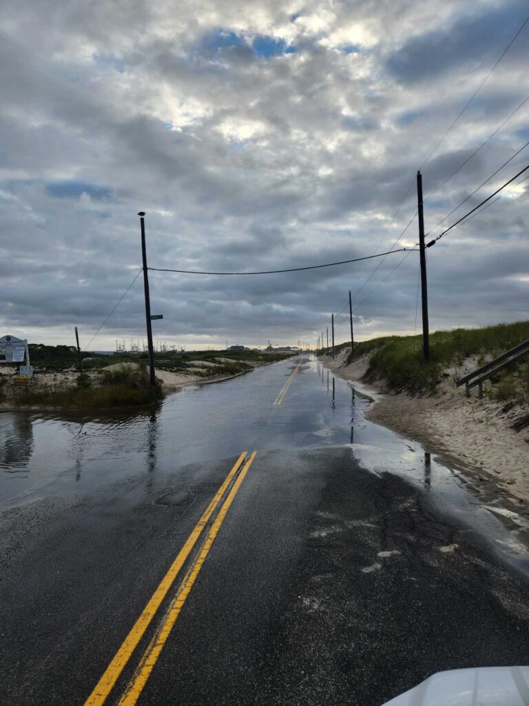 a road with water on the side (MyCoast AI)