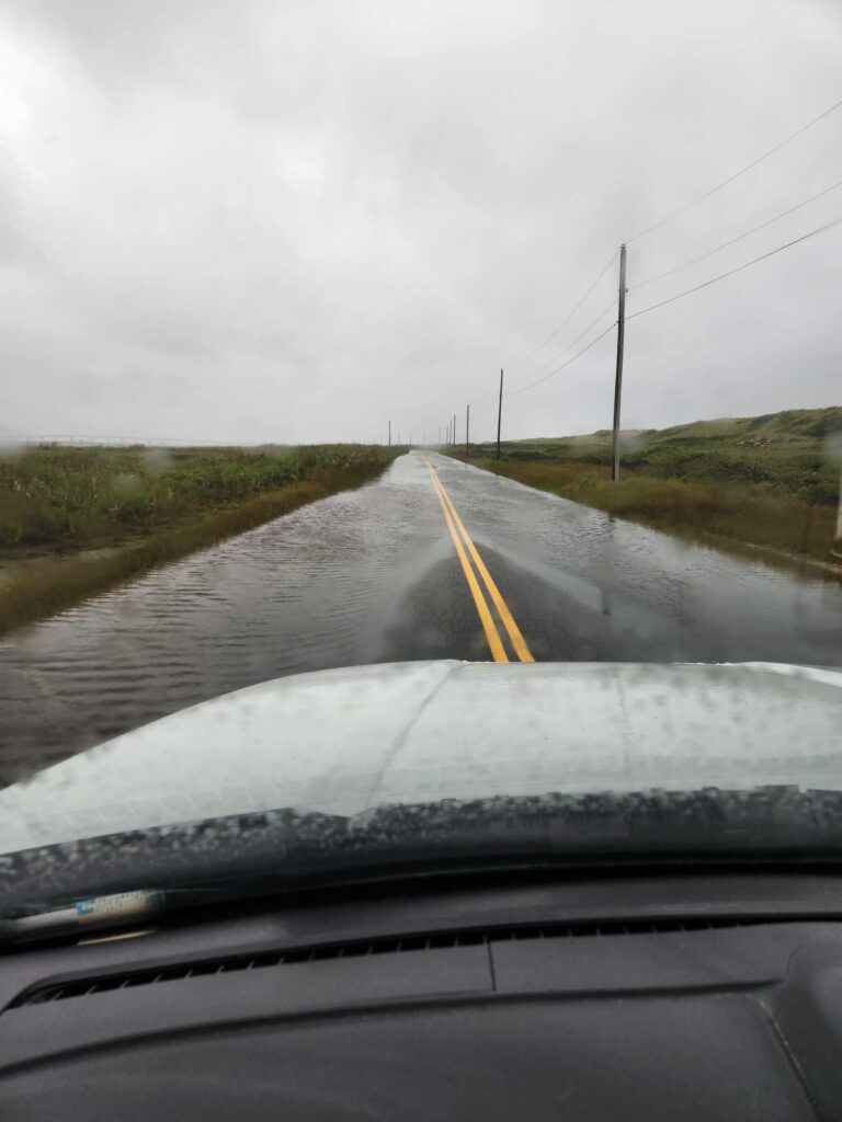 a road with water on the side (MyCoast AI)