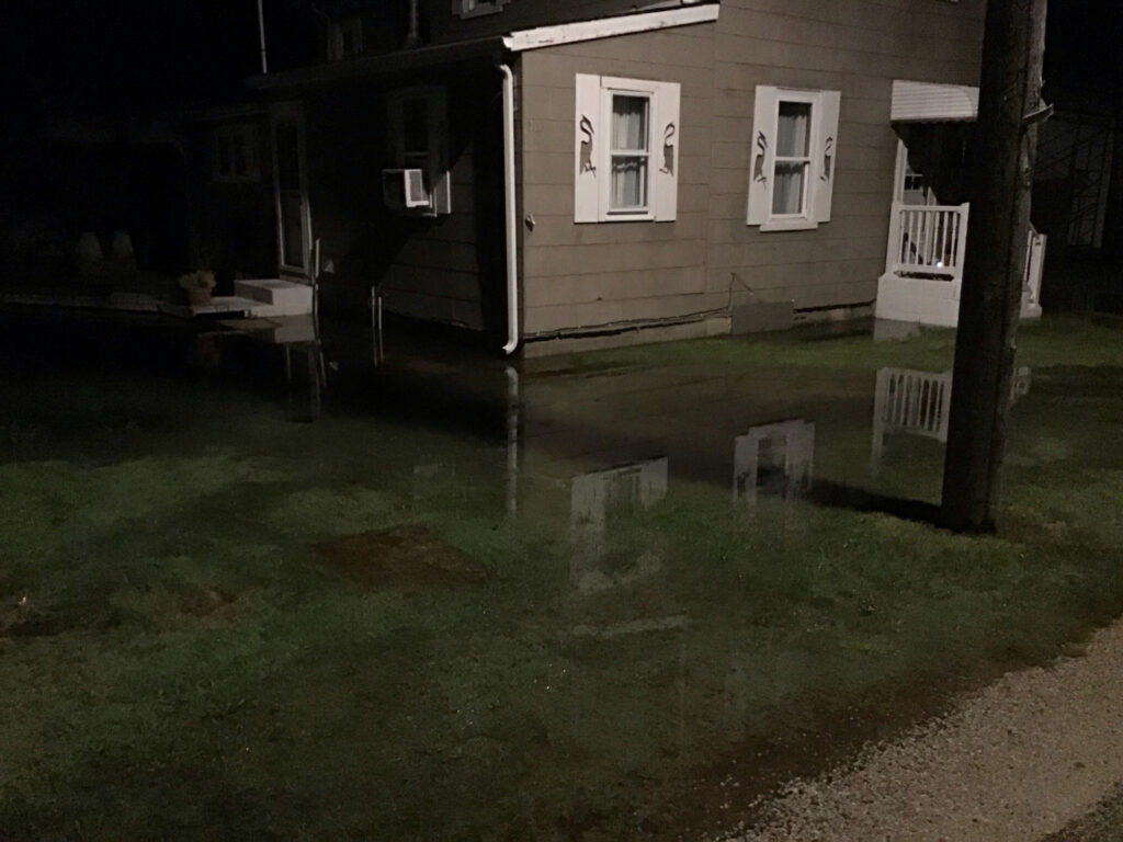 a house with a pool of water (MyCoast AI)