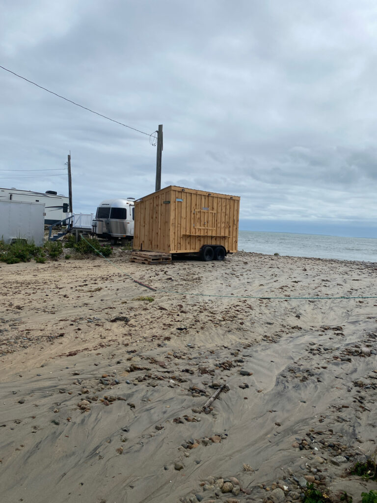 a trailer on a beach (MyCoast AI)