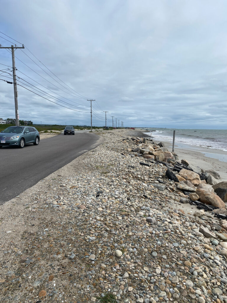 cars on a road by a beach (MyCoast AI)