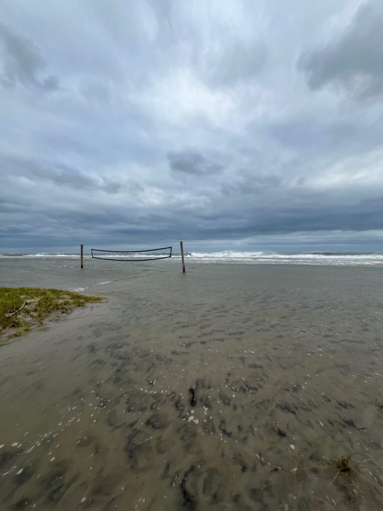 a beach with a pier (MyCoast AI)