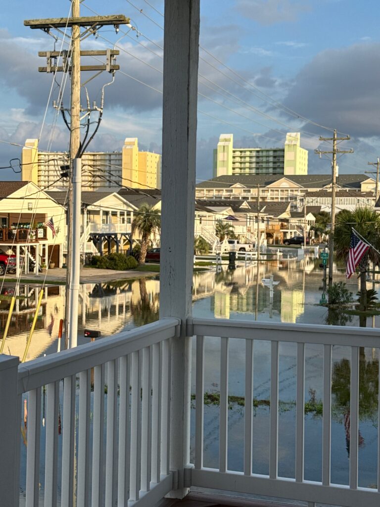 a view of a city from a balcony (MyCoast AI)