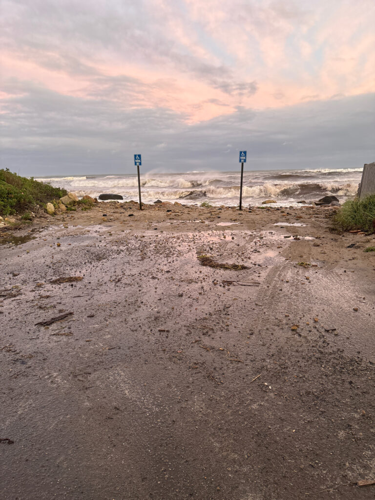 a beach with signs (MyCoast AI)