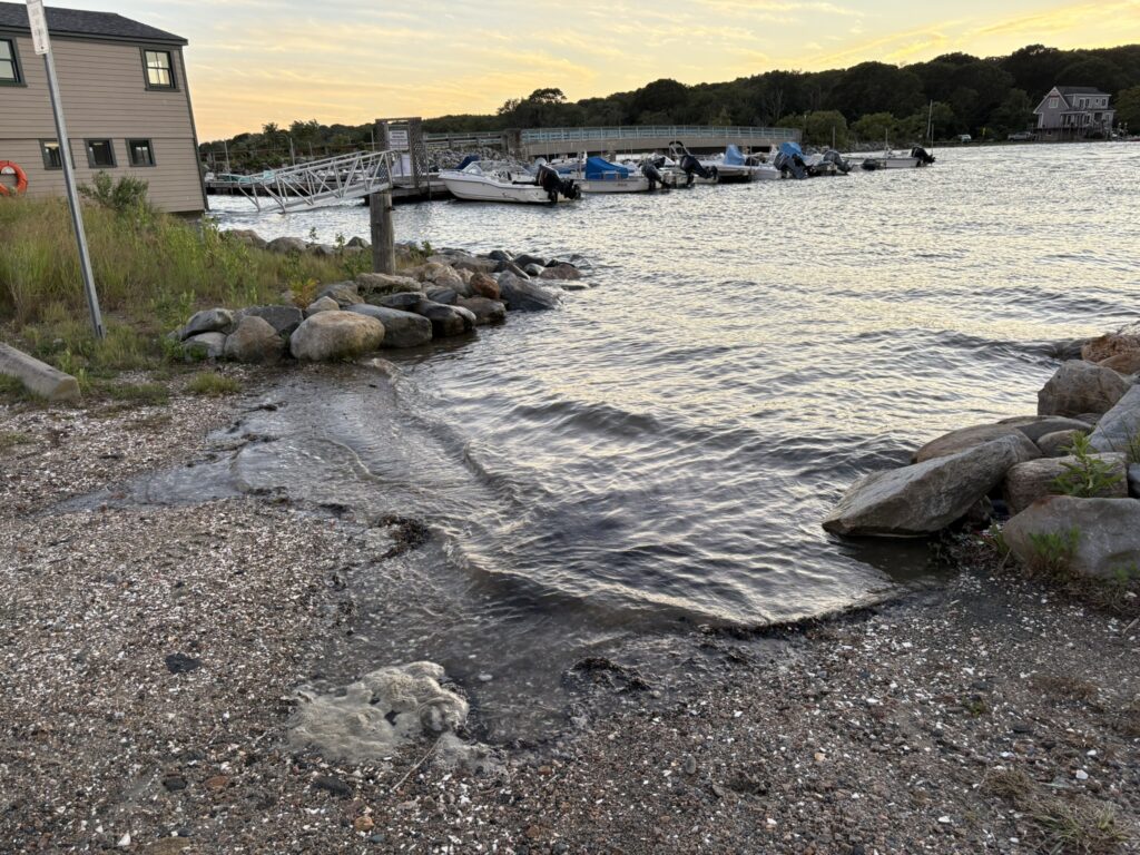 a rocky beach with boats (MyCoast AI)