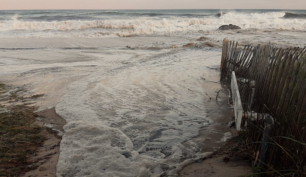 a beach with waves crashing (MyCoast AI)