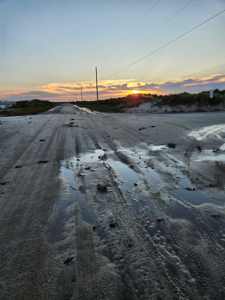 a snowy road with a sunset (MyCoast AI)
