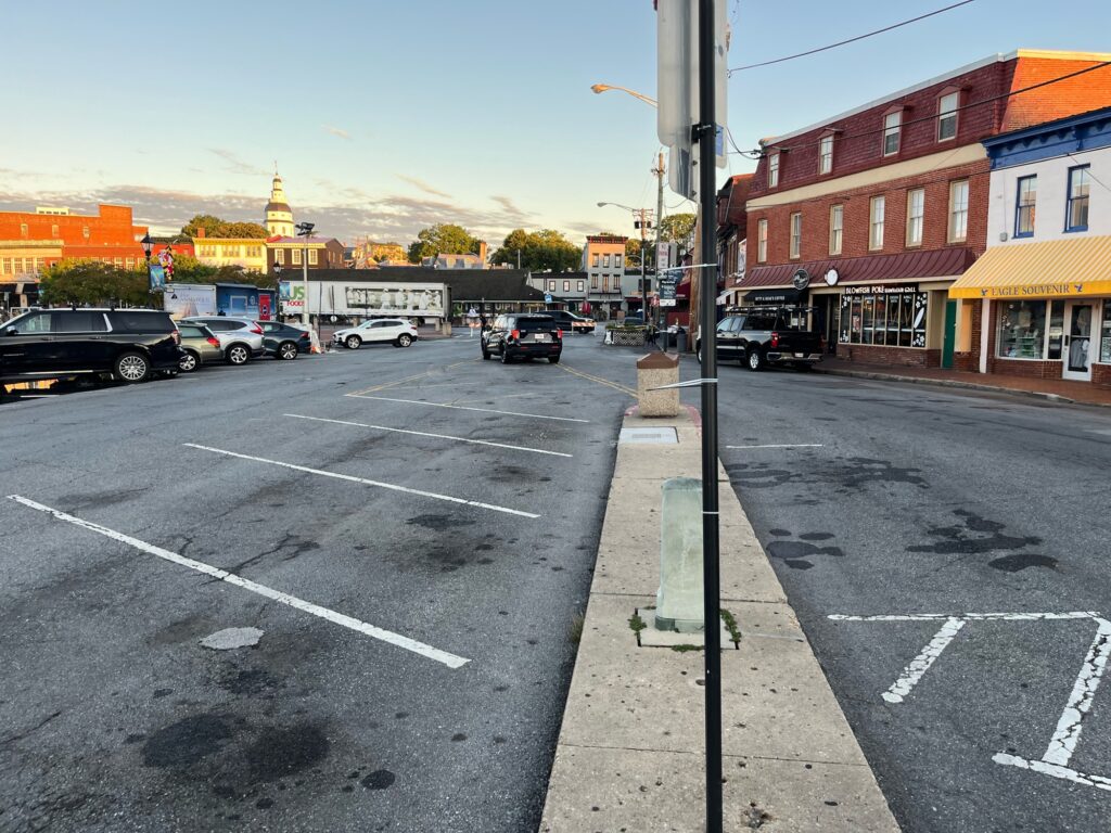a street with cars parked on the side (MyCoast AI)