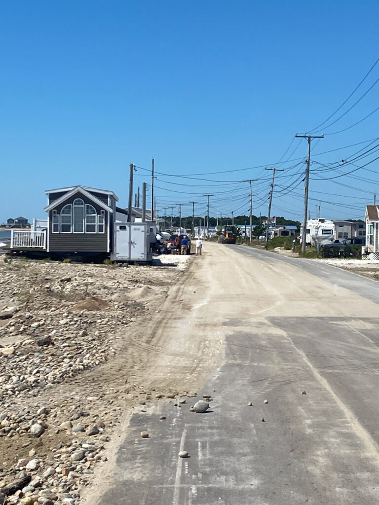 a road with a building on the side (MyCoast AI)