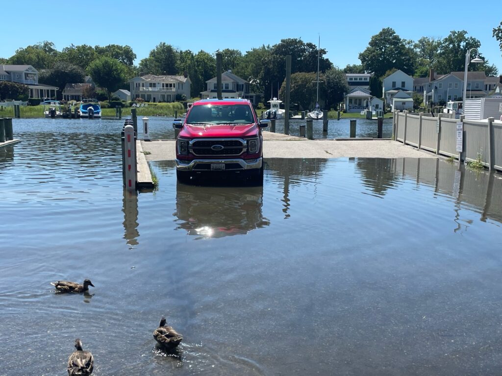 a car driving through a flooded area (MyCoast AI)