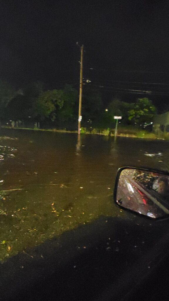 a car driving on a wet road (MyCoast AI)