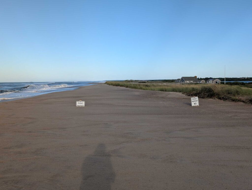 a person's shadow on a beach (MyCoast AI)