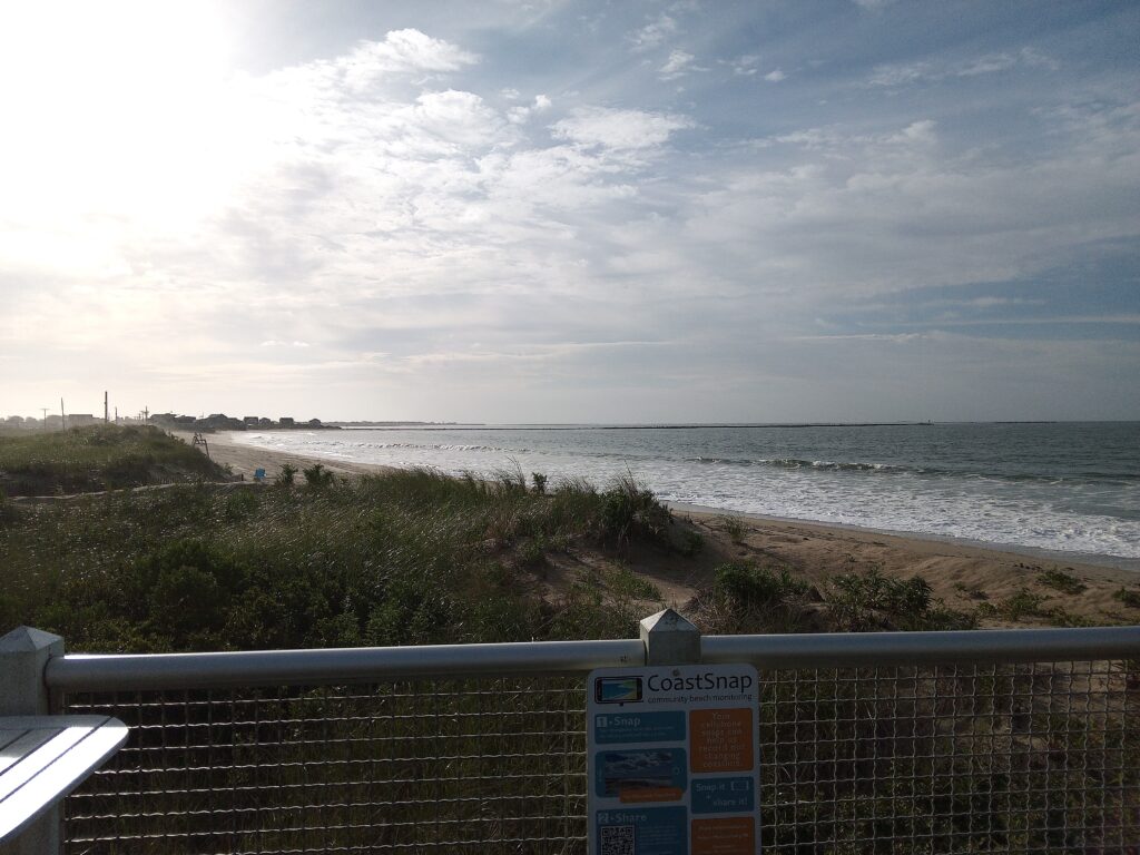 a beach with a sign (MyCoast AI)