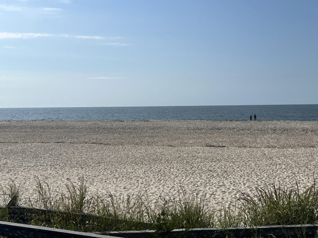 a beach with people on it (MyCoast AI)