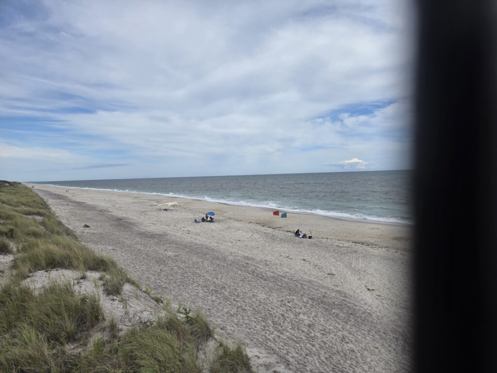 a beach with people on it (MyCoast AI)