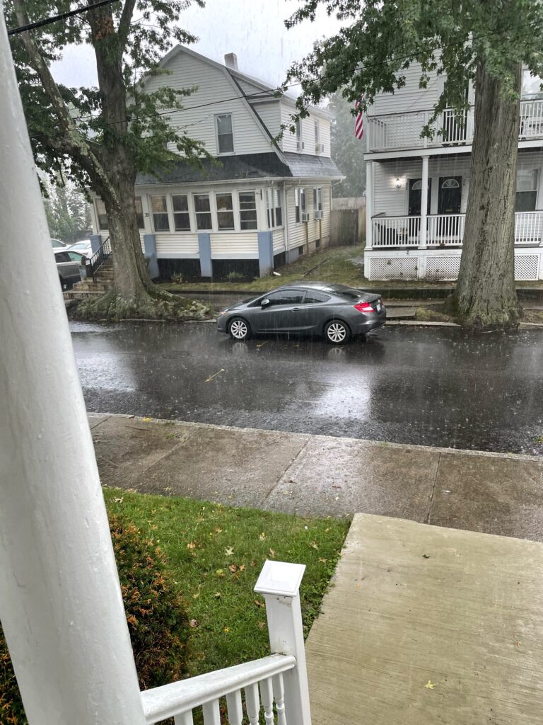 a car parked in a driveway (MyCoast AI)