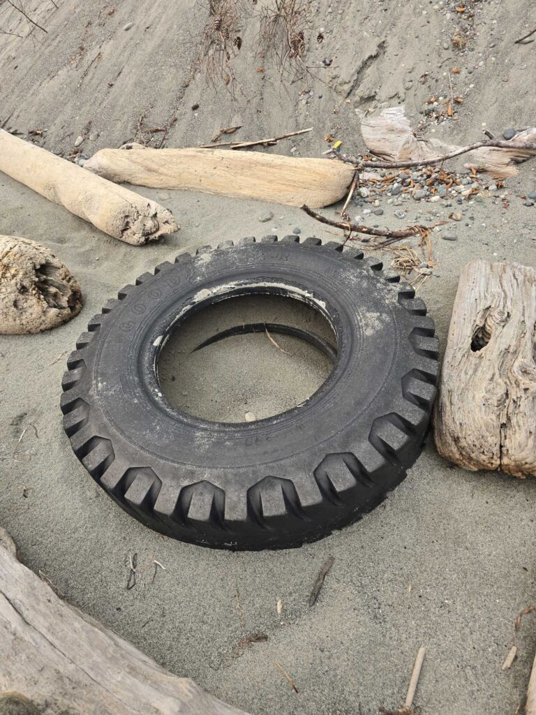 a tire on the ground (MyCoast AI)