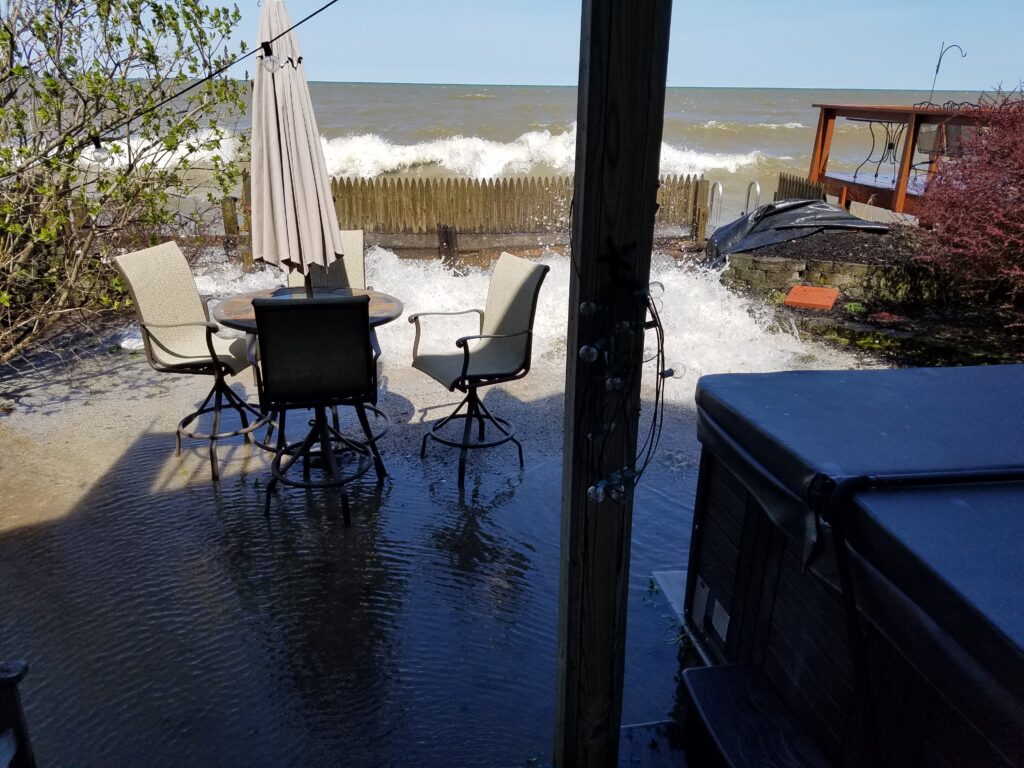 a table and chairs on a deck (MyCoast AI)