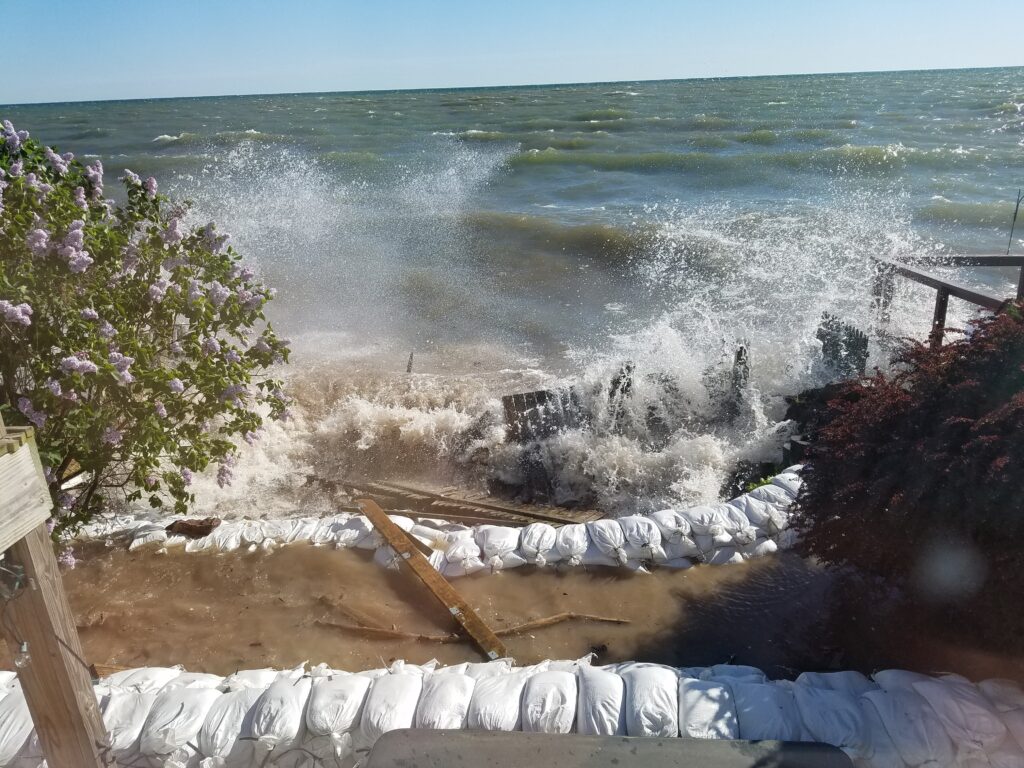 a wave crashing on a beach (MyCoast AI)