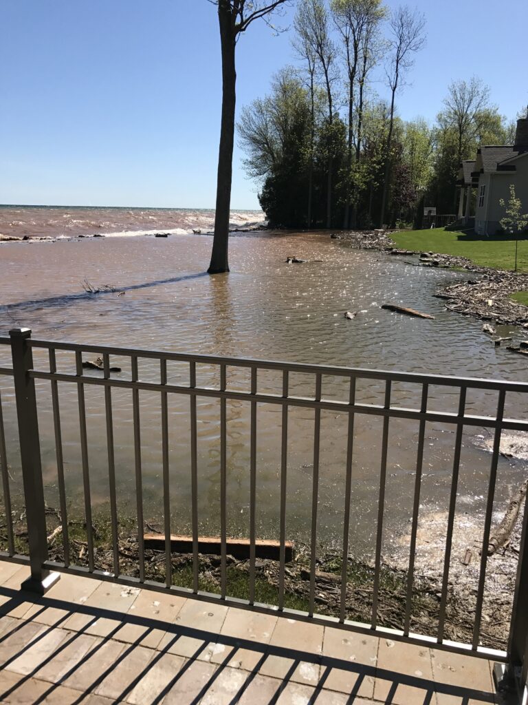 a wooden deck overlooking a river (MyCoast AI)